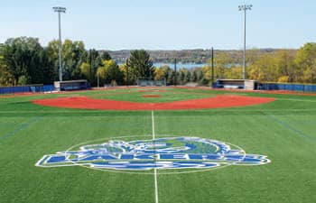 FLCC Lakers baseball diamond and turf field, with a view of Canandaigua lake in the background.